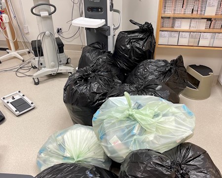 Bags of waste in the OR after a surgery